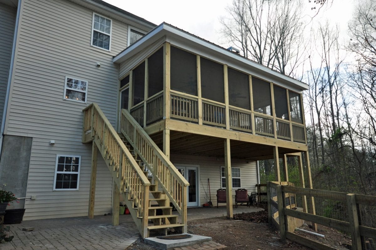 Covered Deck Addition with Custom Fireplace Taber Residential